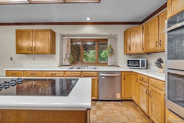 1665 W 113th Ave, Denver, CO 80234 - kitchen with appliances with stainless steel finishes, a sink, crown molding, light countertops, and recessed lighting