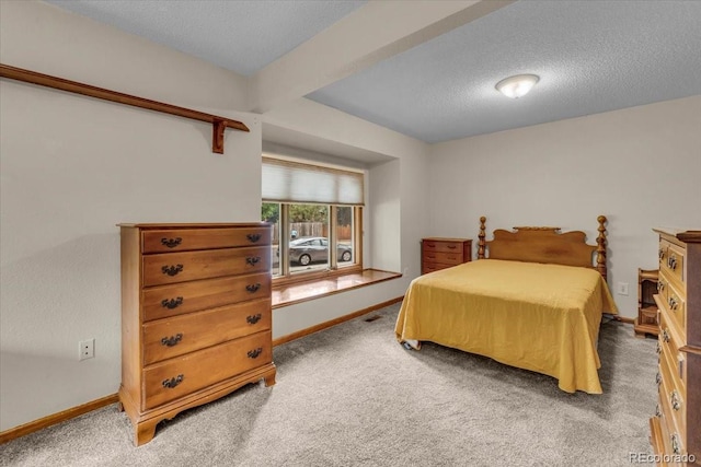 1665 W 113th Ave, Denver, CO 80234 - bedroom featuring carpet, baseboards, and a textured ceiling
