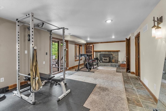 1665 W 113th Ave, Denver, CO 80234 - workout room featuring stone finish floors, baseboards, and recessed lighting