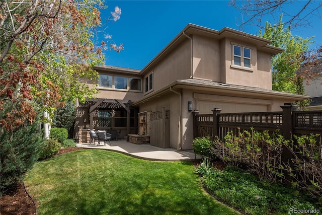 9266 E 35th Ave, Denver, CO 80238 - rear view of house with stucco siding, a patio, a garage, and a pergola
