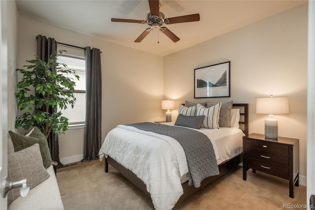 9266 E 35th Ave, Denver, CO 80238 - bedroom featuring light colored carpet, a ceiling fan, and baseboards