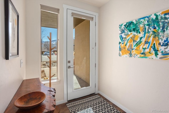 doorway featuring hardwood / wood-style flooring