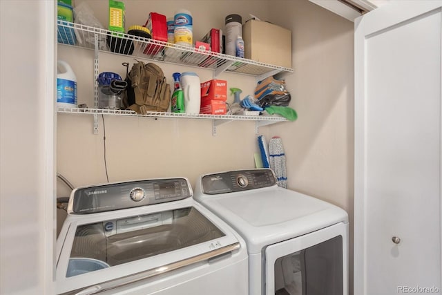 laundry room featuring separate washer and dryer