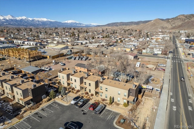 birds eye view of property featuring a mountain view