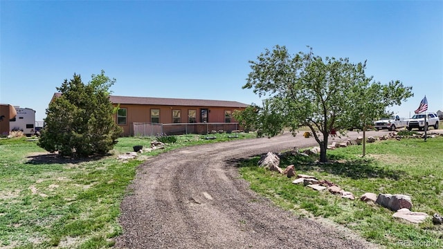 6670 Indian Village Hts, Fountain, CO 80817 - ranch-style house featuring curved driveway