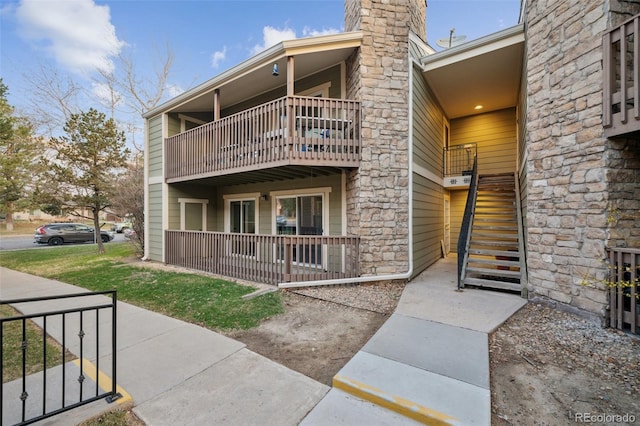 3400 S Eagle St Unit 104, Aurora, CO 80014 - view of property featuring stairs