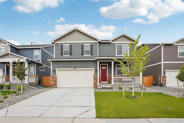 715 N Amory St, Watkins, CO 80137 - craftsman inspired home with a porch, an attached garage, driveway, and stone siding