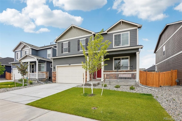 715 N Amory St, Watkins, CO 80137 - craftsman inspired home with covered porch, an attached garage, and concrete driveway