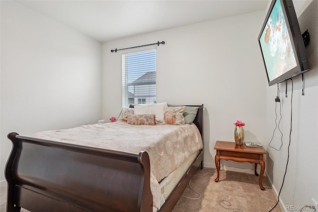 715 N Amory St, Watkins, CO 80137 - carpeted bedroom with baseboards