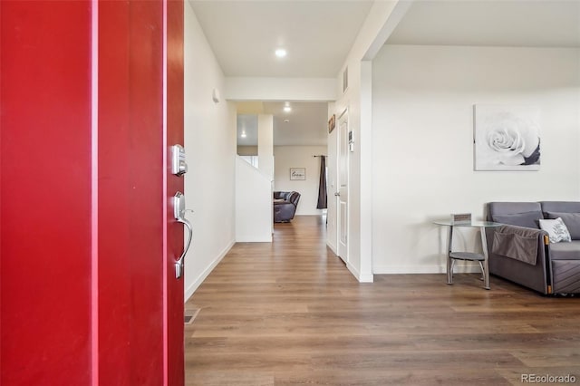 715 N Amory St, Watkins, CO 80137 - foyer with wood finished floors, baseboards, and recessed lighting