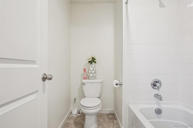 715 N Amory St, Watkins, CO 80137 - full bathroom featuring baseboards, toilet, and shower / tub combination