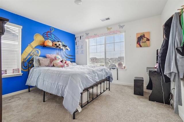 715 N Amory St, Watkins, CO 80137 - bedroom featuring multiple windows, carpet, and baseboards