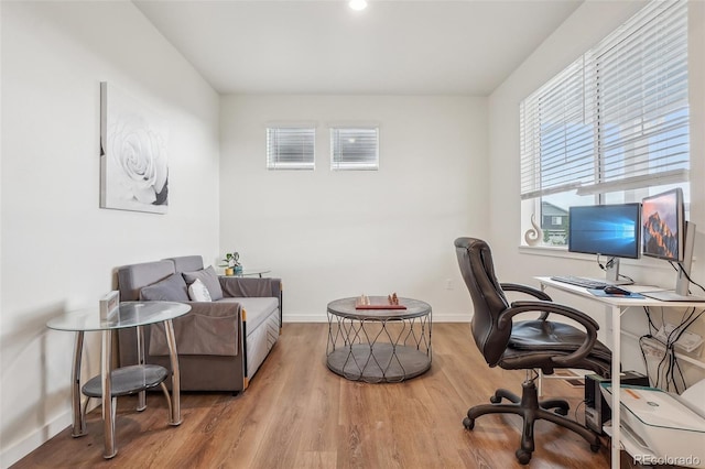 715 N Amory St, Watkins, CO 80137 - office space featuring wood finished floors and baseboards