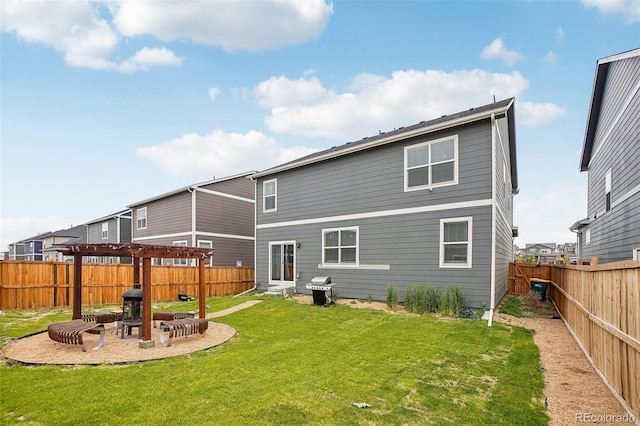 715 N Amory St, Watkins, CO 80137 - back of property with an outdoor fire pit