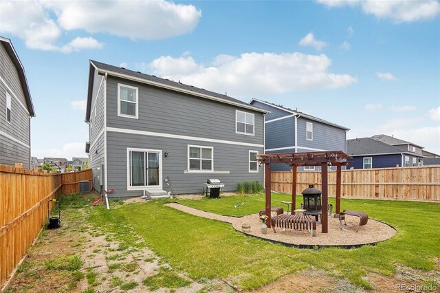 715 N Amory St, Watkins, CO 80137 - rear view of property featuring a pergola, central AC unit, and a patio