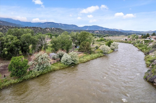 aerial view with a water and mountain view