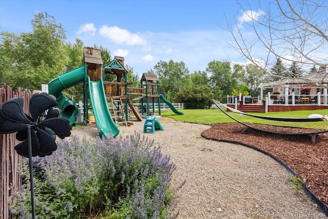 view of jungle gym with a lawn