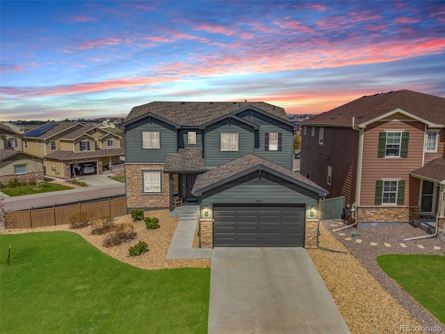 view of front of house featuring stone siding, concrete driveway, and a residential view