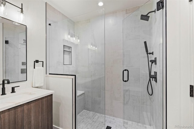 bathroom featuring vanity and walk in shower