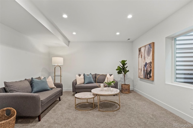 living room featuring light carpet