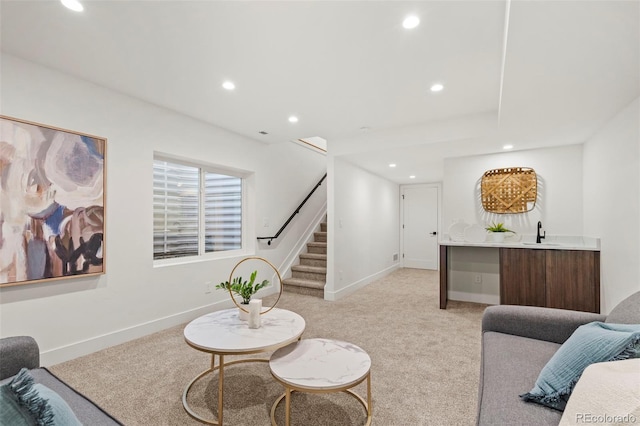 living room with light colored carpet and wet bar