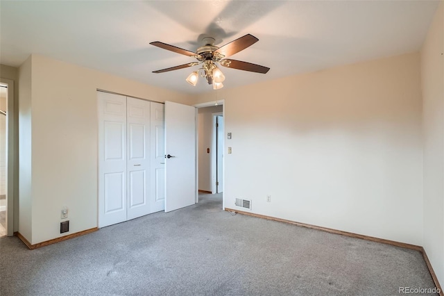 30839 Manitoba Dr, Evergreen, CO 80439 - unfurnished bedroom with carpet flooring, a closet, and a ceiling fan