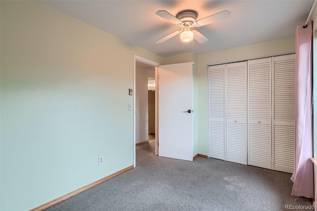 30839 Manitoba Dr, Evergreen, CO 80439 - unfurnished bedroom with carpet flooring, a closet, and ceiling fan