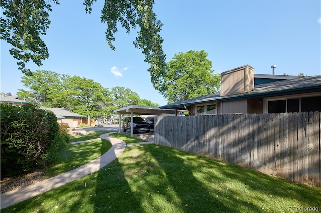 8713 E Roundtree Ave, Greenwood Village, CO 80111 - view of yard featuring a carport