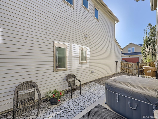 view of property exterior featuring a patio