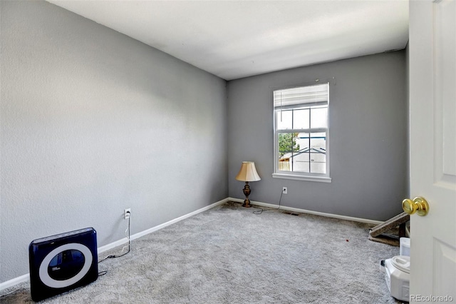 view of carpeted spare room