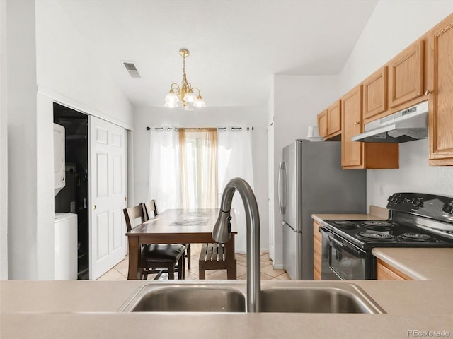 1748 Eagle St Unit B, Aurora, CO 80011 - kitchen featuring under cabinet range hood, a sink, light tile patterned floors, and black range with electric stovetop