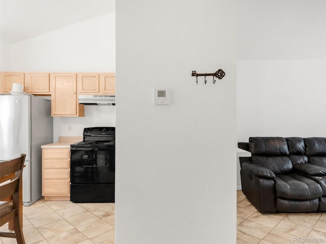 1748 Eagle St Unit B, Aurora, CO 80011 - kitchen with freestanding refrigerator, light brown cabinets, open floor plan, black electric range oven, and under cabinet range hood