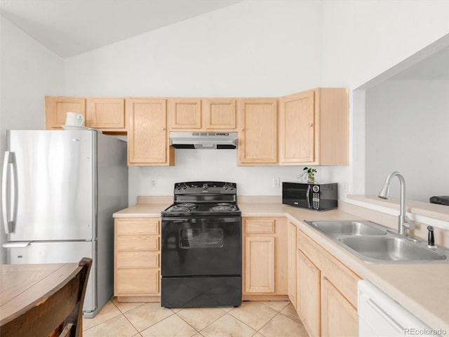 1748 Eagle St Unit B, Aurora, CO 80011 - kitchen featuring under cabinet range hood, light brown cabinets, and black appliances