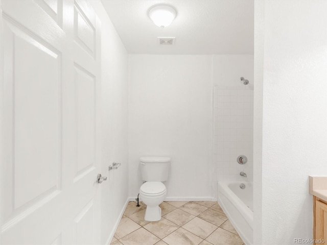 1748 Eagle St Unit B, Aurora, CO 80011 - full bath with toilet, tile patterned floors, visible vents, baseboards, and vanity