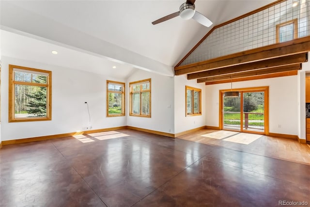 475 Vail Cir, Dillon, CO 80435 - unfurnished living room featuring baseboards, plenty of natural light, finished concrete flooring, vaulted ceiling, and recessed lighting