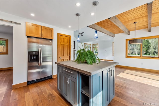 475 Vail Cir, Dillon, CO 80435 - kitchen featuring stainless steel fridge, baseboards, open floor plan, light wood-type flooring, and recessed lighting