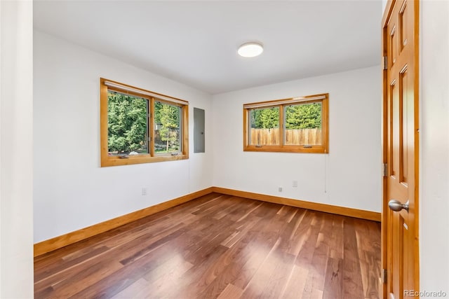 475 Vail Cir, Dillon, CO 80435 - empty room featuring electric panel, baseboards, and wood finished floors