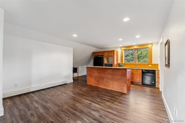 475 Vail Cir, Dillon, CO 80435 - kitchen with black appliances, a baseboard radiator, dark wood-style flooring, recessed lighting, and a kitchen island