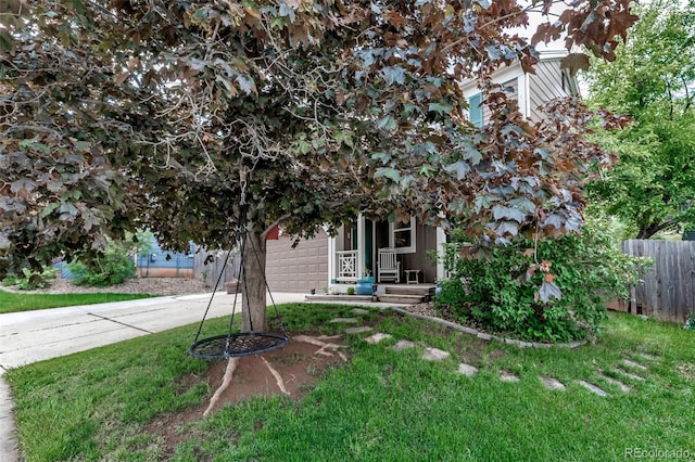 573 Entrada Dr, Golden, CO 80401 - obstructed view of property featuring driveway and an attached garage