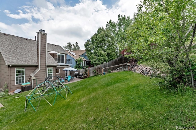 573 Entrada Dr, Golden, CO 80401 - view of yard featuring a patio