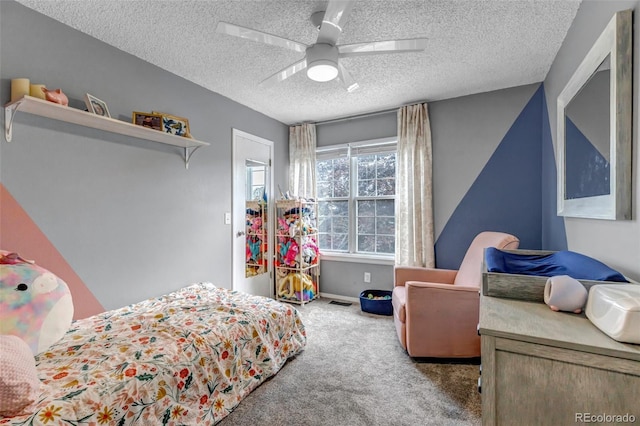 573 Entrada Dr, Golden, CO 80401 - carpeted bedroom with a textured ceiling and ceiling fan