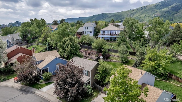 573 Entrada Dr, Golden, CO 80401 - aerial perspective of suburban area with a mountainous background