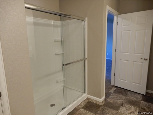 bathroom featuring walk in shower