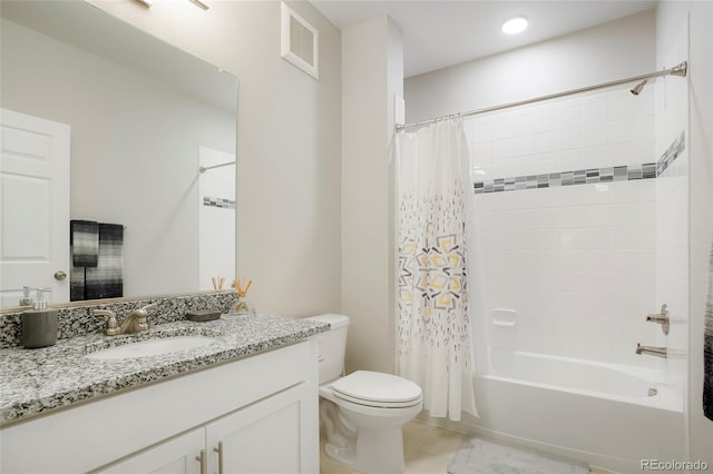 full bathroom with shower / bath combination with curtain, tile patterned flooring, vanity, and toilet