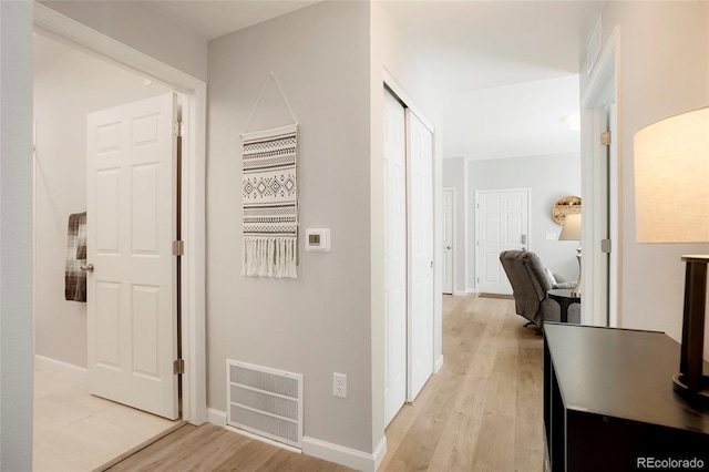 hall featuring light hardwood / wood-style floors