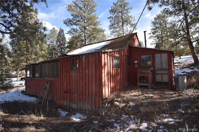 view of snow covered property