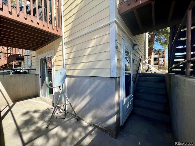 view of side of home featuring a patio