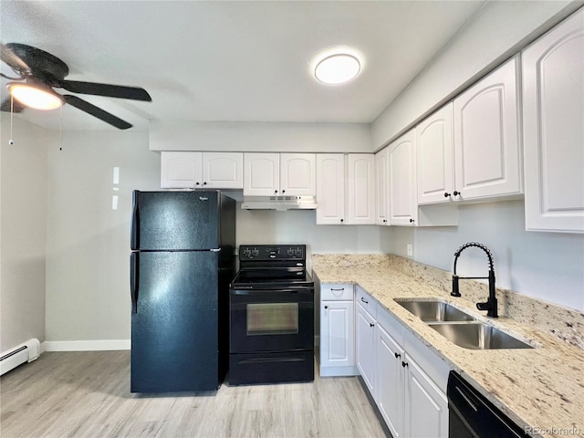 kitchen with black appliances, white cabinets, light wood-type flooring, and sink