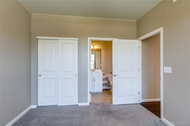 15619 Syracuse Way, Thornton, CO 80602 - unfurnished bedroom with carpet floors and a closet