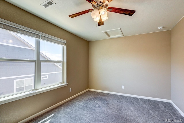 15619 Syracuse Way, Thornton, CO 80602 - carpeted spare room featuring attic access, a smoke detector, and ceiling fan
